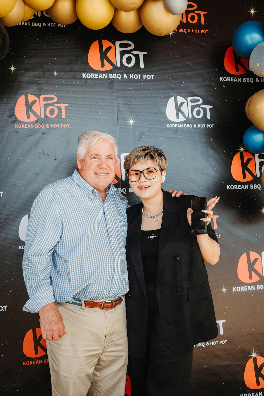 Photographers and flashlights at a red carpet premiere event